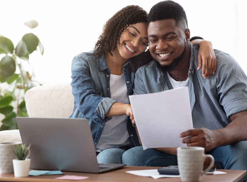 couple looking at bank statement 