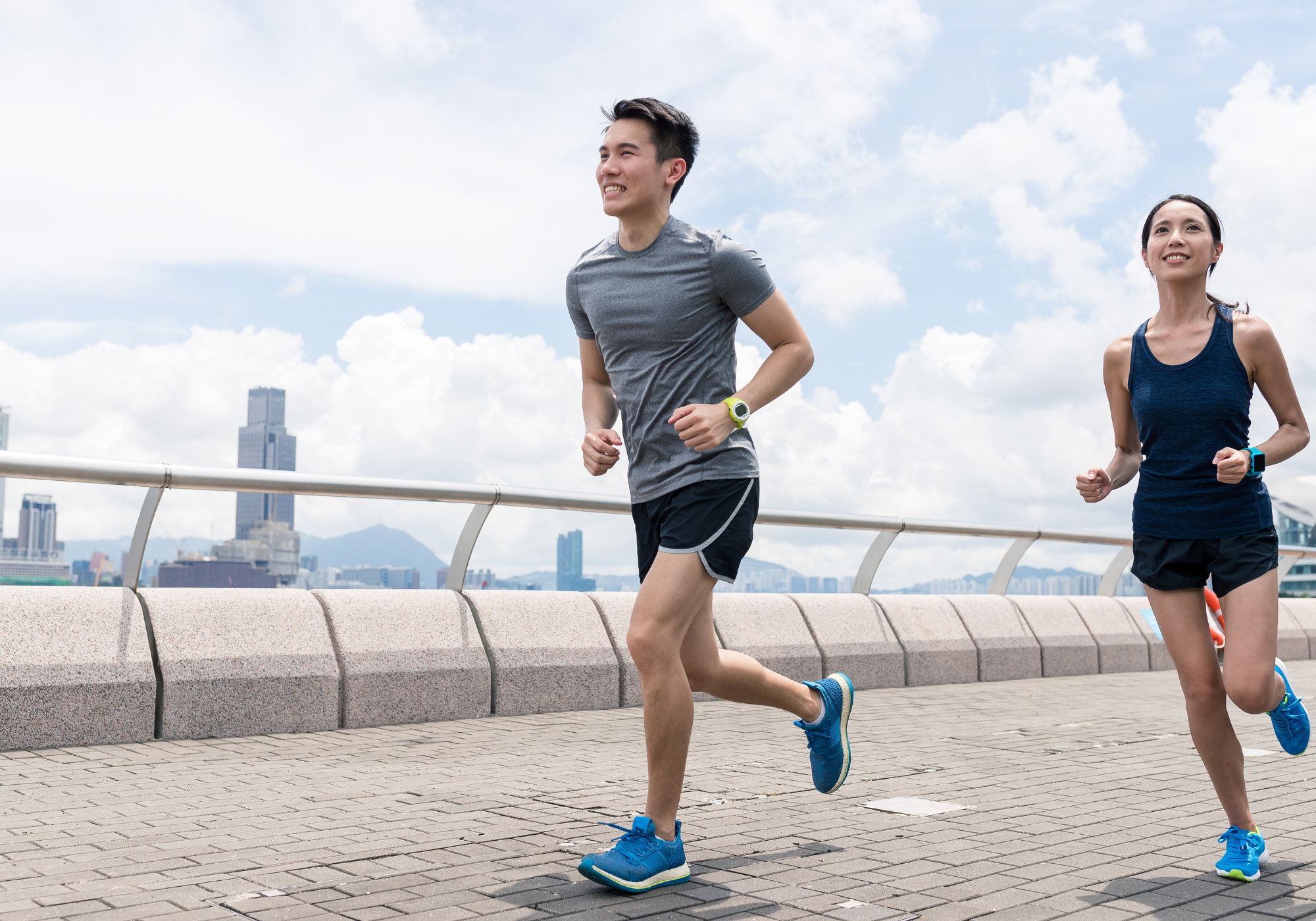 couple going for a run in the city 