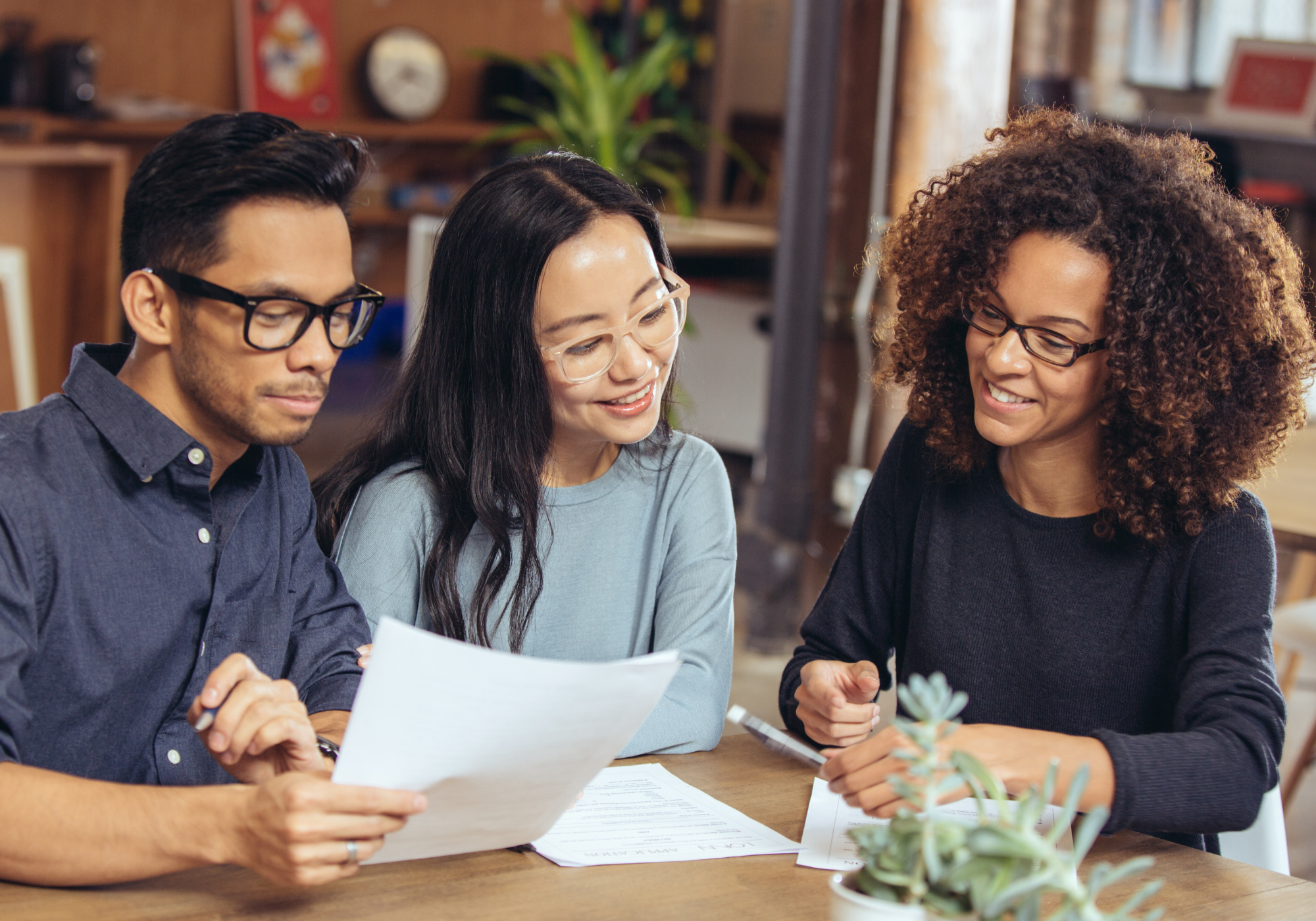 couple reviewing finances with financial counselor 