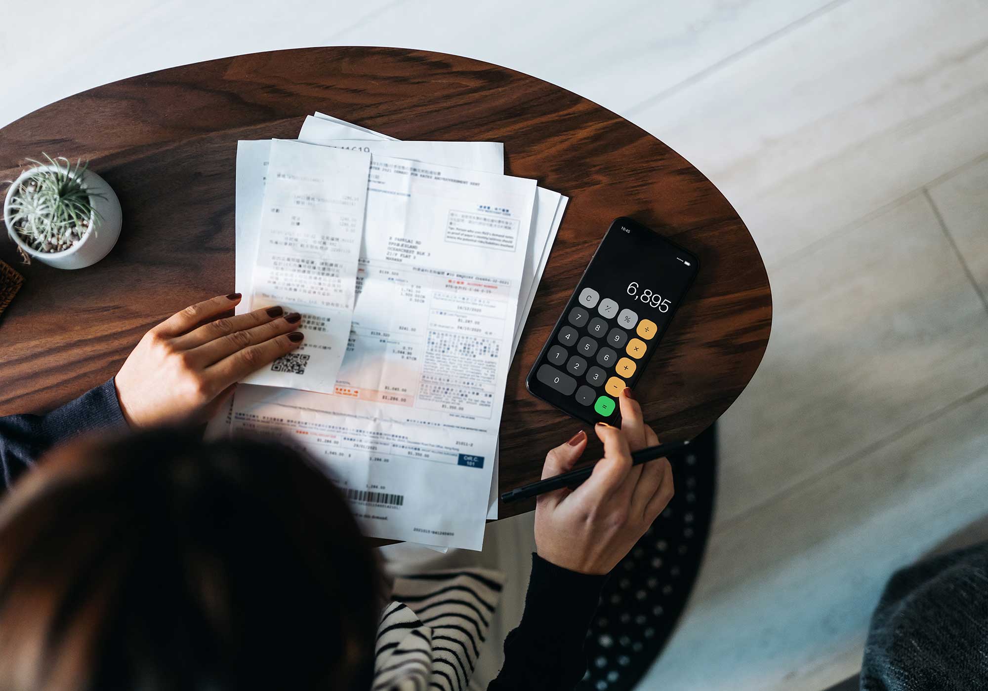 woman calculating debt